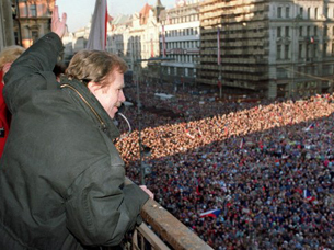 Vaclav Havel, a dissident playwright and leading member of the Czechoslovak opposition Civic Forum, who drafted large parts of Charter 77, the declaration which helped attract international attention to the civil rights abuses in Czechoslovakia, waves 10 December 1989 to the crowd of thousands of demonstrators gathered on Prague's Wenceslas Square, celebrating the communist capitulation and nomination of the new government formed by Marian Calfa from Slovak dissident movement the Public Against Violence. At the end of 1989, Havel was elected first president of the then Czechoslovakia when the state-communist system crumbled in the Velvet Revolution. AFP PHOTO LUBOMIR KOTEK